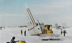 Sailboat during winter being hauled over the ice 