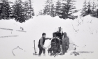 Snowmobile stuck and buried in deep snow