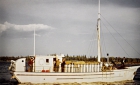 Schooner with a load of containers