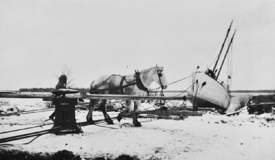 Example of using horse power to pull a schooner