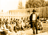 Blind Chief Missabay addressing the assembly before the feast held after the James Bay Treaty signing ceremony, Osnaburgh House, July 12, 1905.